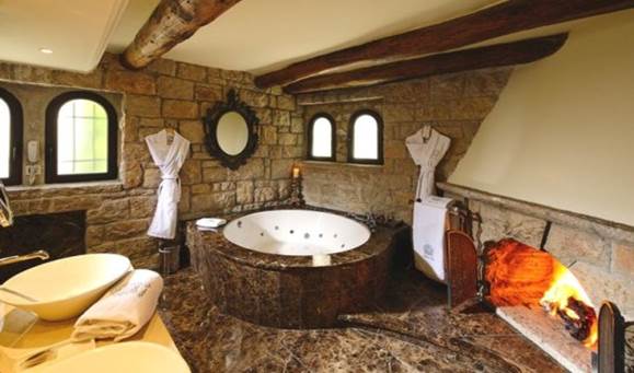 http://www.funnyandhappy.com/wp-content/uploads/2013/01/Beautiful-stone-bathroom-533x345.jpg